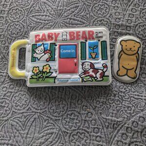 Vintage 1982 Johnson & Johnson Baby Bear plays at home soft book